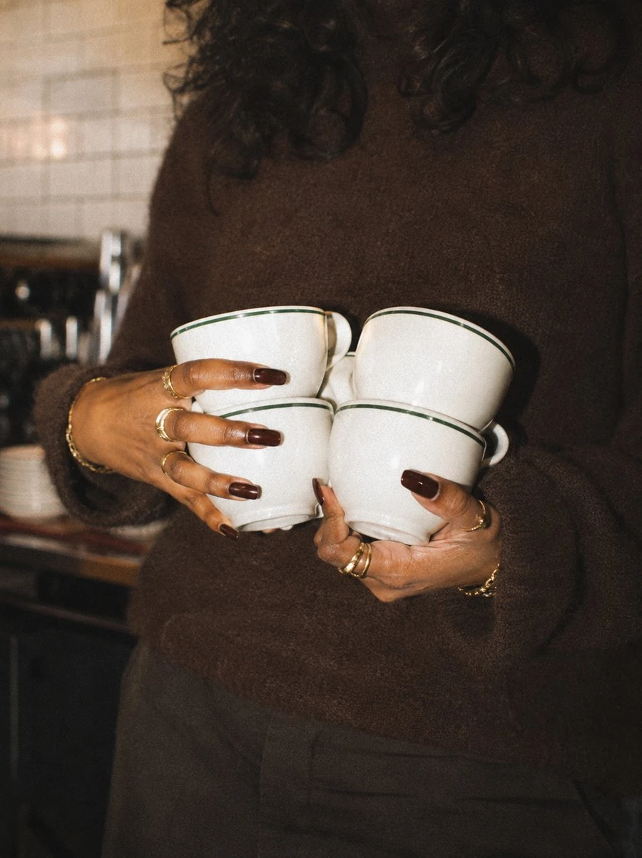 A toast with coffee cups