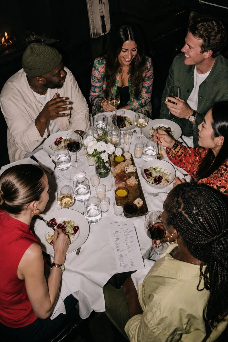 Members gathered around the table for a founders dinner
